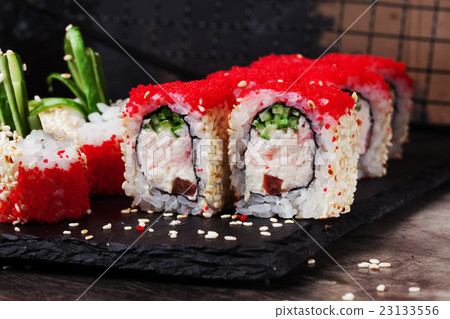 beautiful roll with crab, cucumber tobiko caviar  23133556