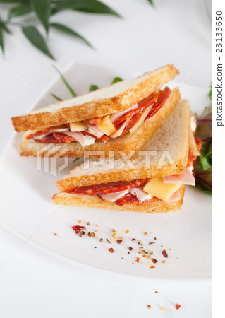 sandwiches with sausage and cheese 23133650