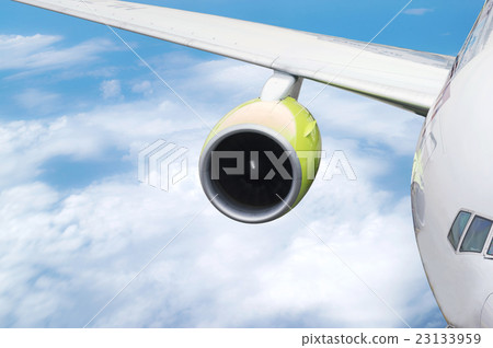 Closeup to the wing of the airplane. Closeup to the wing of the airplane. 23133959
