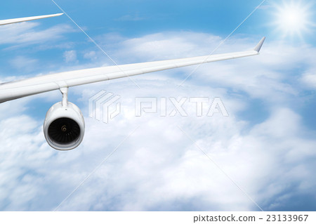 Closeup to the wing of the airplane. Closeup to the wing of the airplane. 23133967