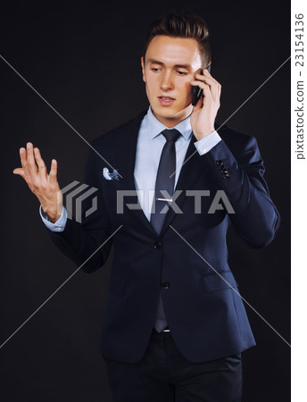 young pretty business man standing on black young pretty business man standing on black 23154136