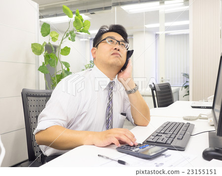 A businessman worried about the sky 23155151