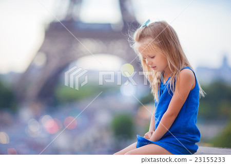 Adorable little girl in Paris background the Adorable little girl in Paris background the 23155233