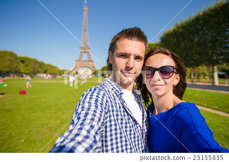 Young happy couple on the Champ de Mars in Paris Young happy couple on the Champ de Mars in Paris 23155835