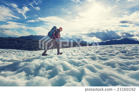 Hiker on glacier 23160192