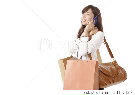 A young woman who enjoys shopping 23162139