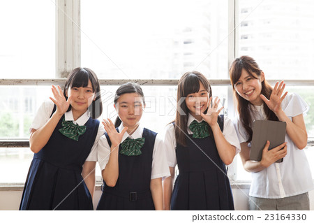 Students at the window side and teachers at the homeroom 23164330