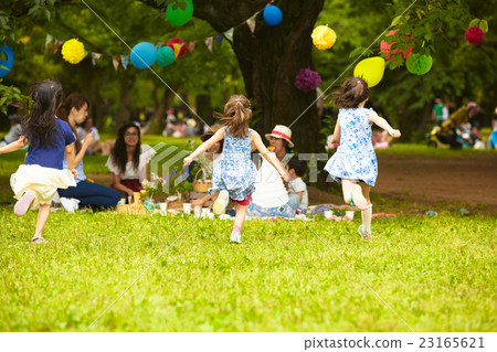 Children playing in the park Children playing in the park 23165621