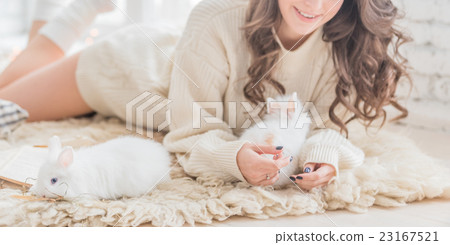 women with rabbit 23167521
