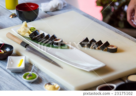 Sushi rolls on white plate. Sushi rolls on white plate. 23175102