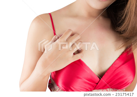 Woman scratching her itchy chest 23175417