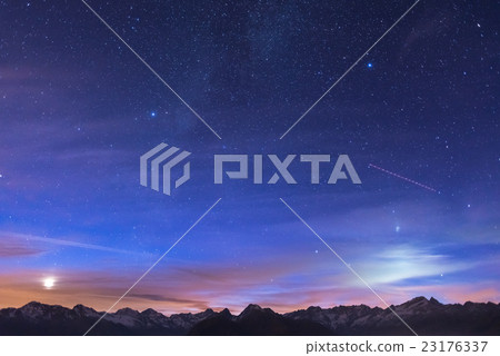 Night on the Alps under starry sky and moonlight 23176337