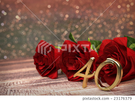 birthday concept with red roses on wooden desk birthday concept with red roses on wooden desk 23176379