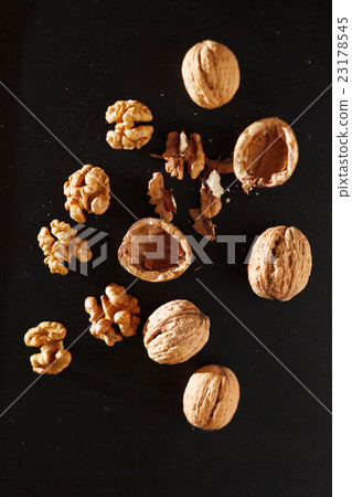walnuts on black background walnuts on black background 23178545