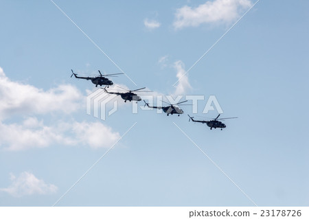 Helicopters flying against the blue sky 23178726