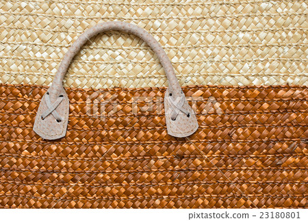 Closeup of handle basket woven 23180801