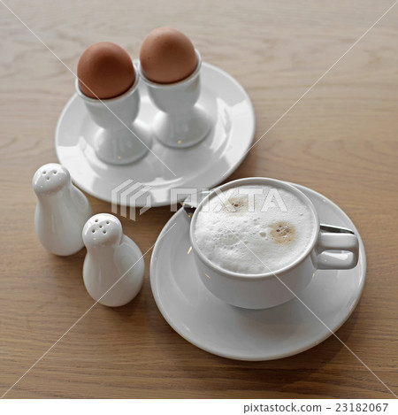 coffee and soft boiled egg in eggcup coffee and soft boiled egg in eggcup 23182067