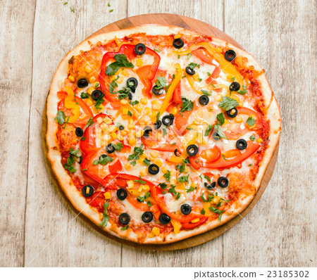 pizza on the wood background pizza on the wood background 23185302