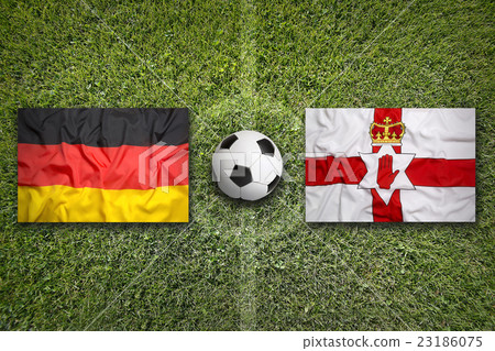 Germany vs. Northern Ireland flags on soccer field 23186075