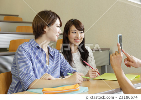 College students taking pictures 23186674