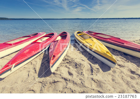 Colorful kayaks moored, Goldopiwo Lake, Mazury 23187763
