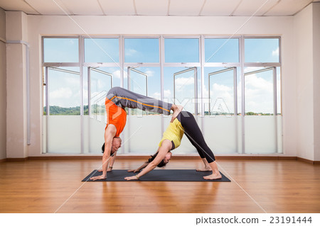 Partner yoga pose of double downward dog pose 23191444
