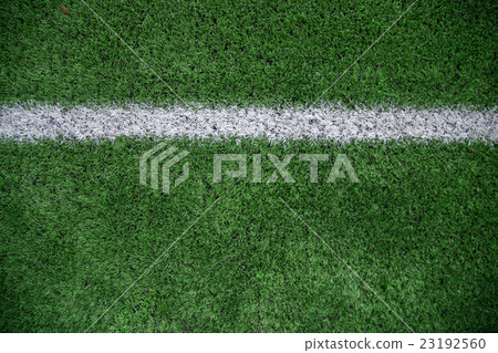 White stripe on the green soccer field White stripe on the green soccer field 23192560