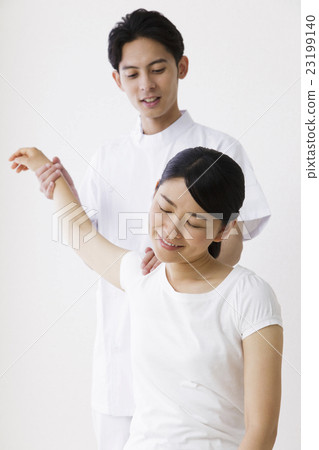Body manipulator massage chiropractic female patient male white back 23199140