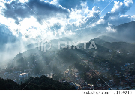Buildings nestled in the green valley of Sapa 23199216