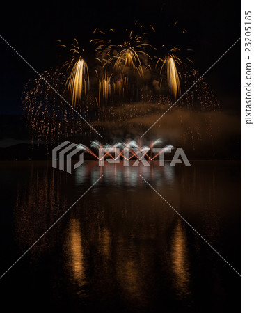 Colorful fireworks with reflection on lake. 23205185