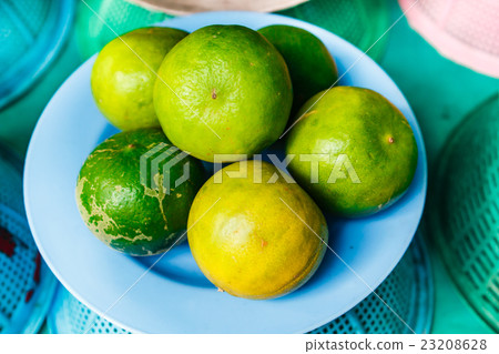 Lemons in local market. 23208628