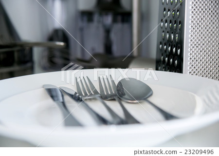 Fork, Spoon and Table Knife on the white Fork, Spoon and Table Knife on the white 23209496