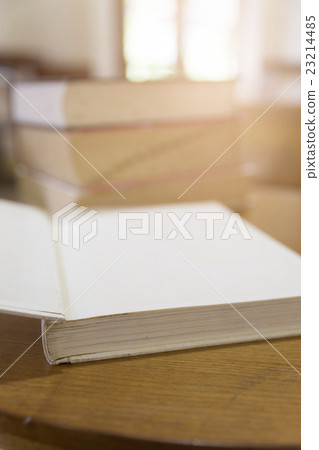 old book with blur library background 23214485