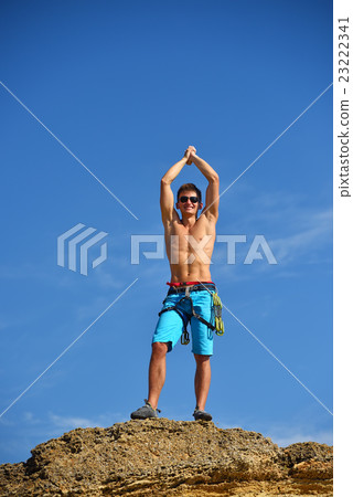 Male Climber Raising Hands Male Climber Raising Hands 23222341