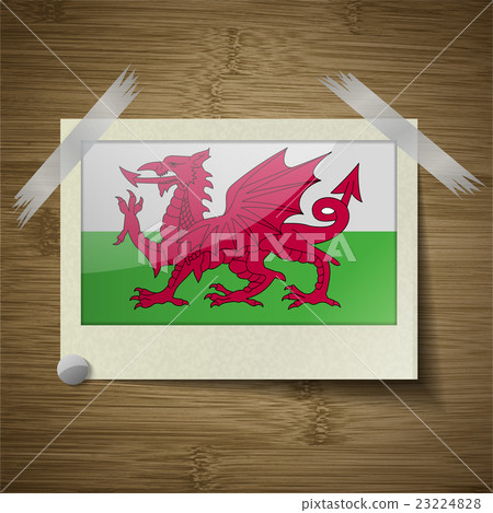 Flags Wales at frame on wooden texture. Vector 23224828