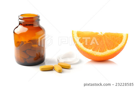 Orange fruit with vitamin c tablet  23228585