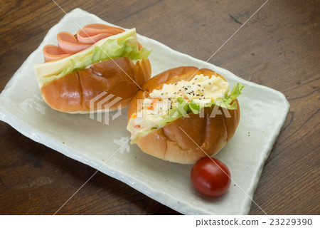 Egg salad and ham cheese sandwich 23229390