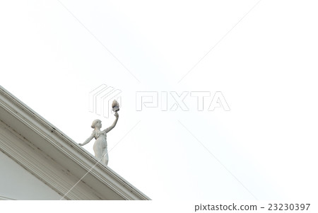 Statue of a child that hold the flame torch Statue of a child that hold the flame torch 23230397