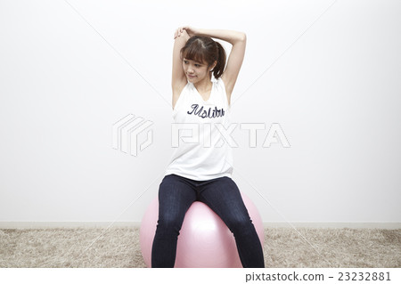 Young woman balancing pole, stretch Young woman balancing pole, stretch 23232881