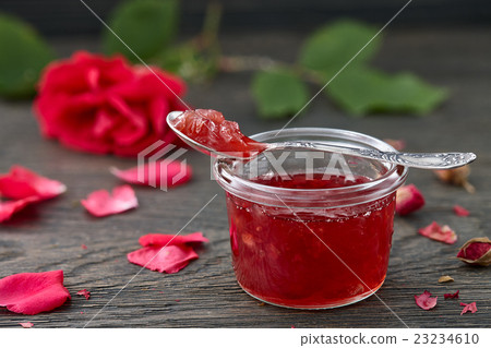 Rose petal jam on dark background Rose petal jam on dark background 23234610