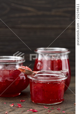 Rose petal jam on dark background Rose petal jam on dark background 23234611