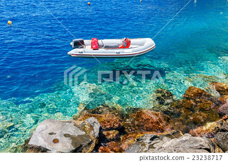 The old fishing harbor in the village Oia. The old fishing harbor in the village Oia. 23238717