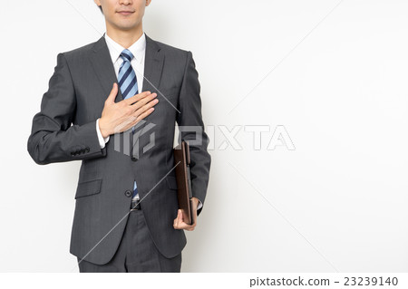 A businessman with a binder 23239140