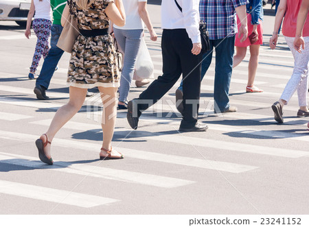 pedestrians cross the road 23241152