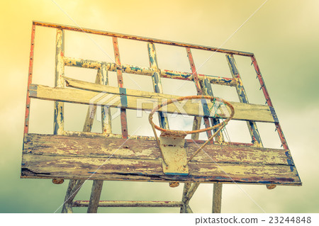 Old outdoor basketball . ( Filtered image processed vintage effect. ) Old outdoor basketball . ( Filtered image processed vintage effect. ) 23244848