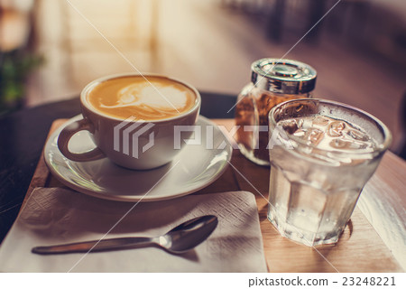 Coffee mug with brown sugar and glass  23248221