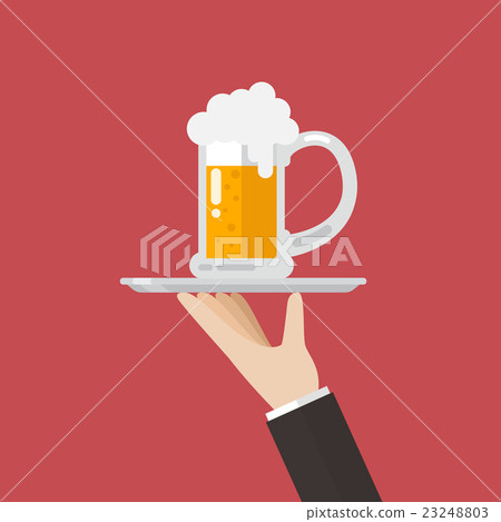 Waiter serving a glass of beer 23248803