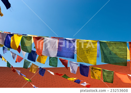 Colorful Buddhist Praying Flags on Blue Sky Colorful Buddhist Praying Flags on Blue Sky 23253608