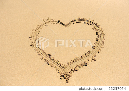 Heart drawn on sand 23257054