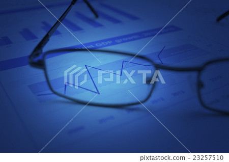 Rise up graph with glasses on financial graph 23257510
